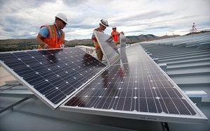 Installing rooftop solar. 
