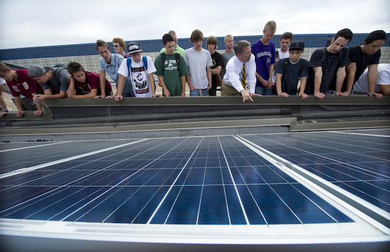 Students look at a solar array at their school in Littleton, Colo. Courtesy NREL.