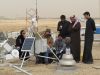Saudi and NREL engineers installing solar monitoring equipment. Credit NREL, Steve Wilcox