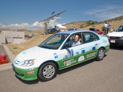 hybrid Honda at NREL in front of a solar array
