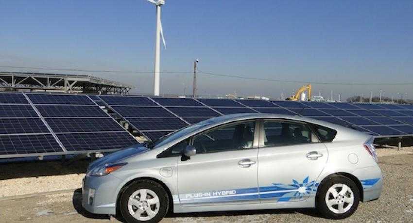 Wind, solar and hybrid cars are happy pals. Courtesy, NREL. 