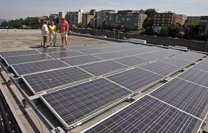 Solar Pie founders on the PEMCO building roof in Seattle